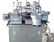 5ML塑料瓶全自动灌装封口冲盖一体机